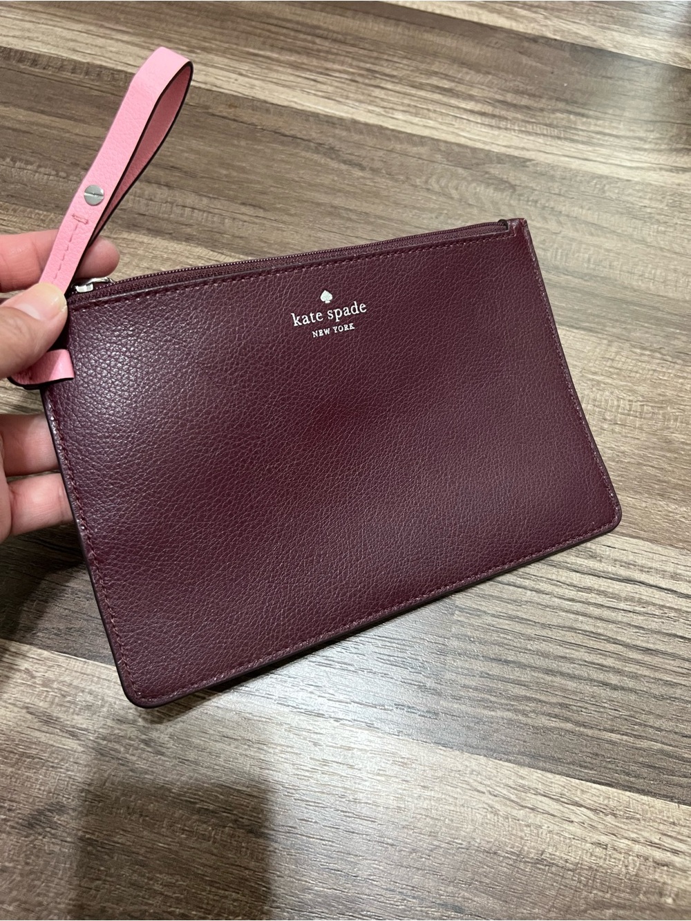 Kate Spade New York Leather Slim Pouch in Wine with Pink Strap
